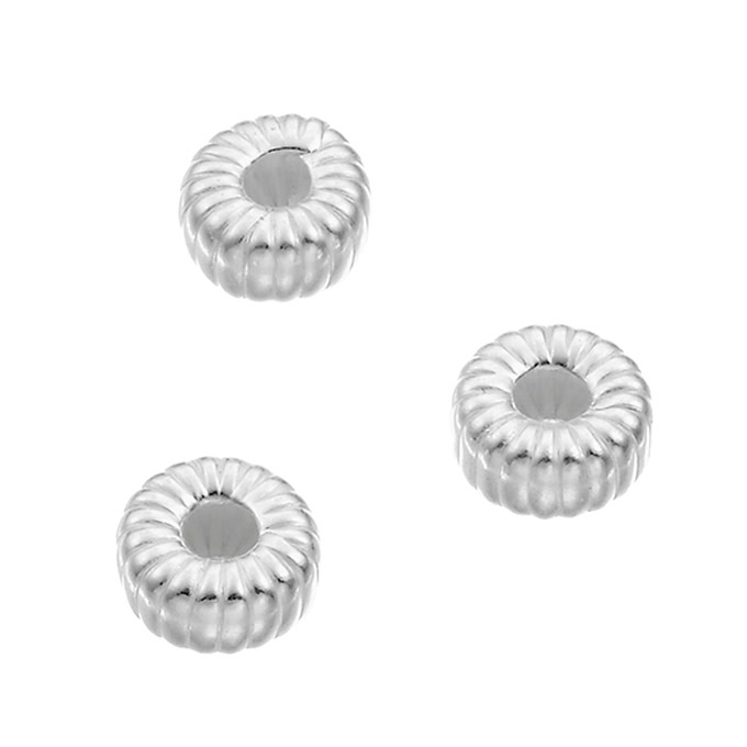 6mm corrugated beaded spacers hole 2mm (approx. 30pcs)